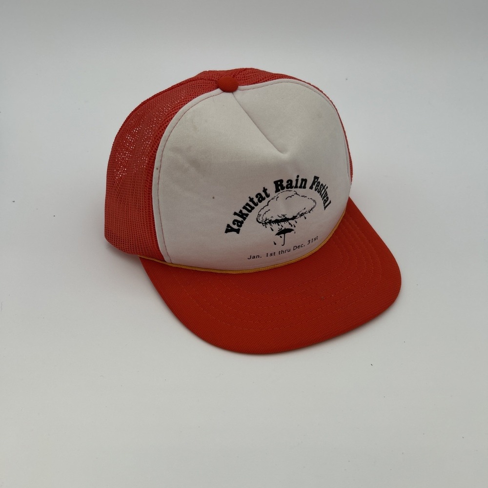 vintage-style orange and white trucker hat  "Yakutat Rain Festiva